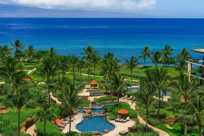 Surrounded by manicured gardens and blue horizons, this oceanfront pool is your tranquil Maui hideaway HKH-211