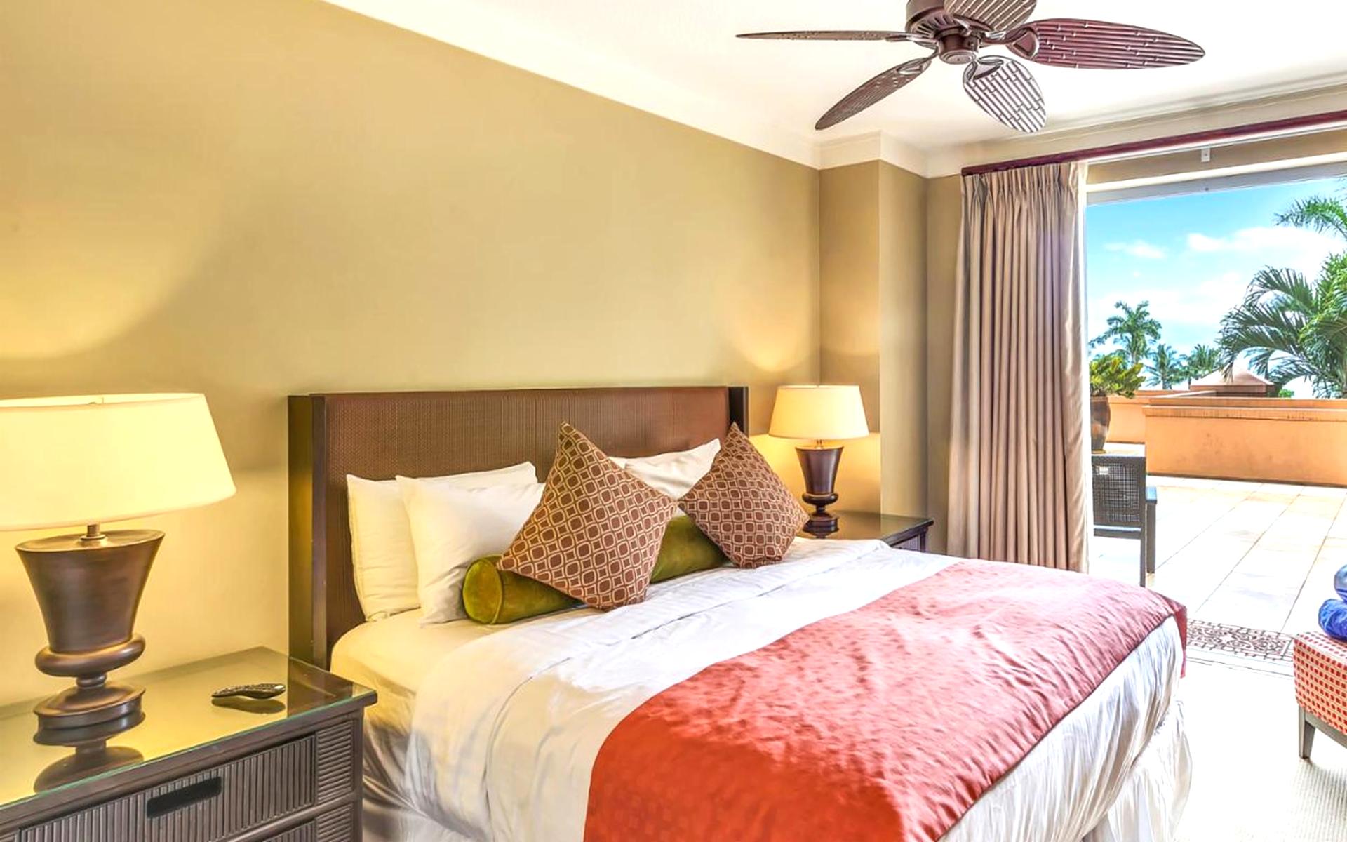 Stylish and comfy guest bedroom with garden views