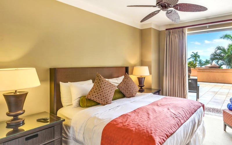 Stylish and comfy guest bedroom with garden views