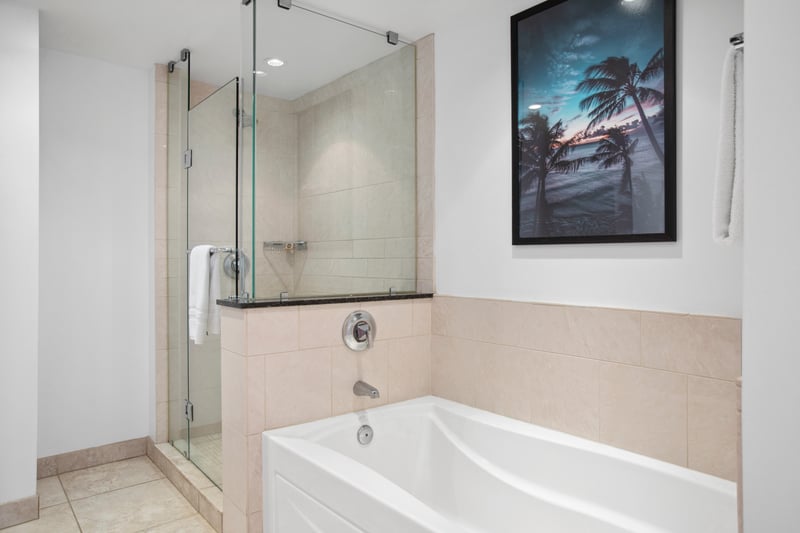 Unwind in style: spa tub, glass shower, and ultimate tranquility