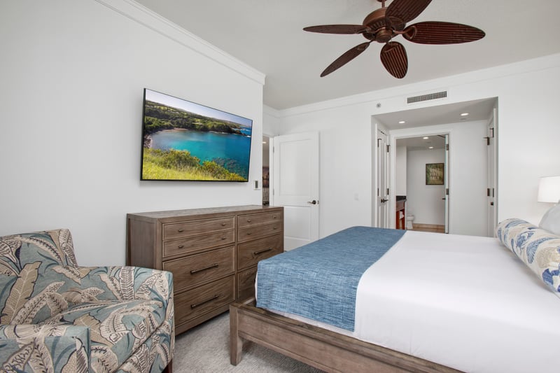 Relax in a bright, breezy bedroom with tranquil island touches
