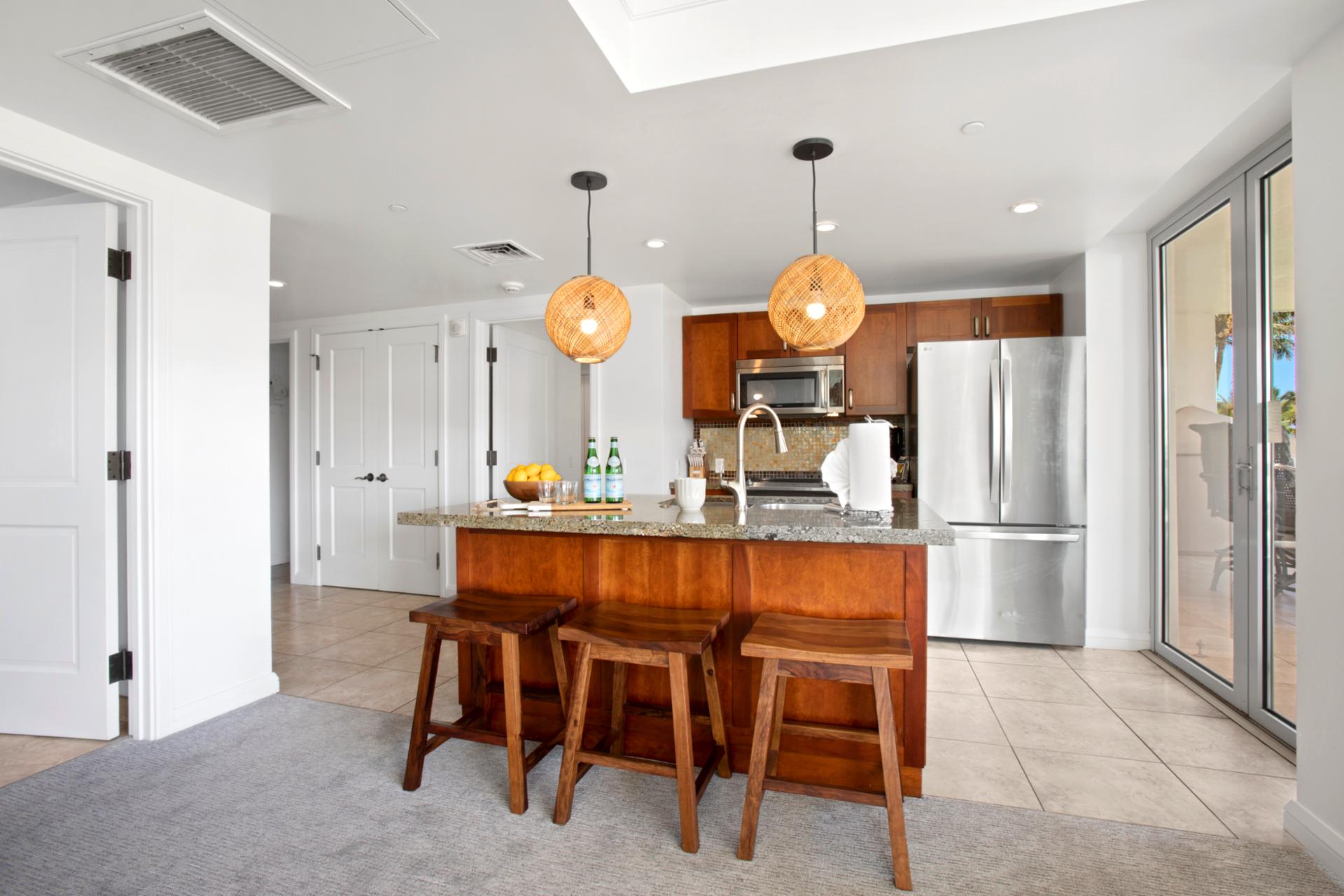 Spacious and bright kitchen with island seating and modern style 