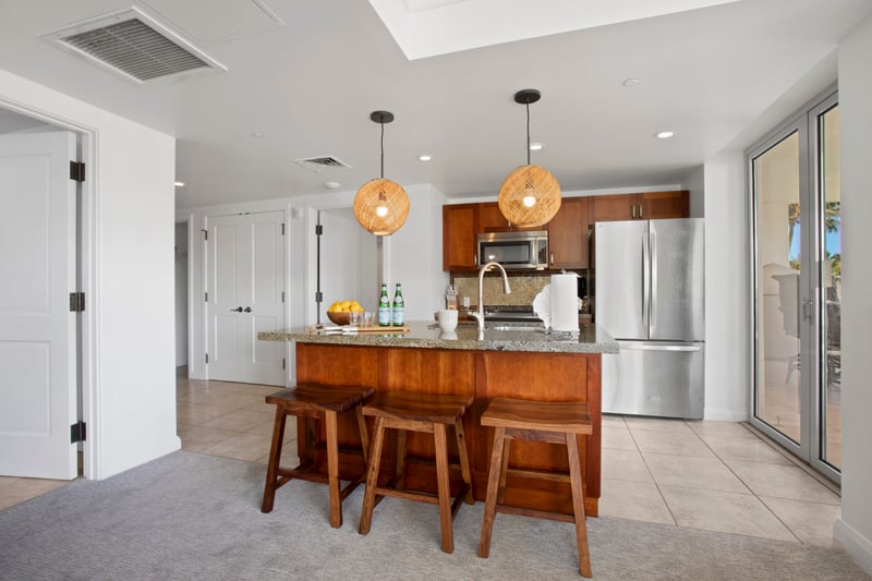 Spacious and bright kitchen with island seating and modern style 