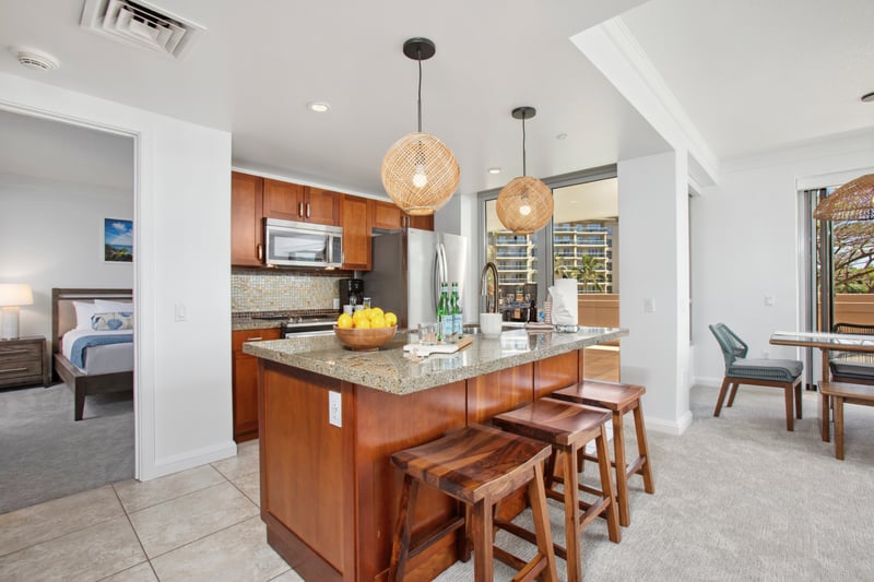 Coastal kitchen charm with natural light and island comfort