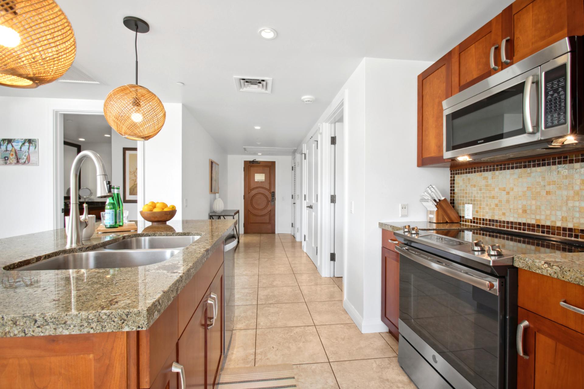 Modern kitchen entryway welcomes you home with warmth and island style