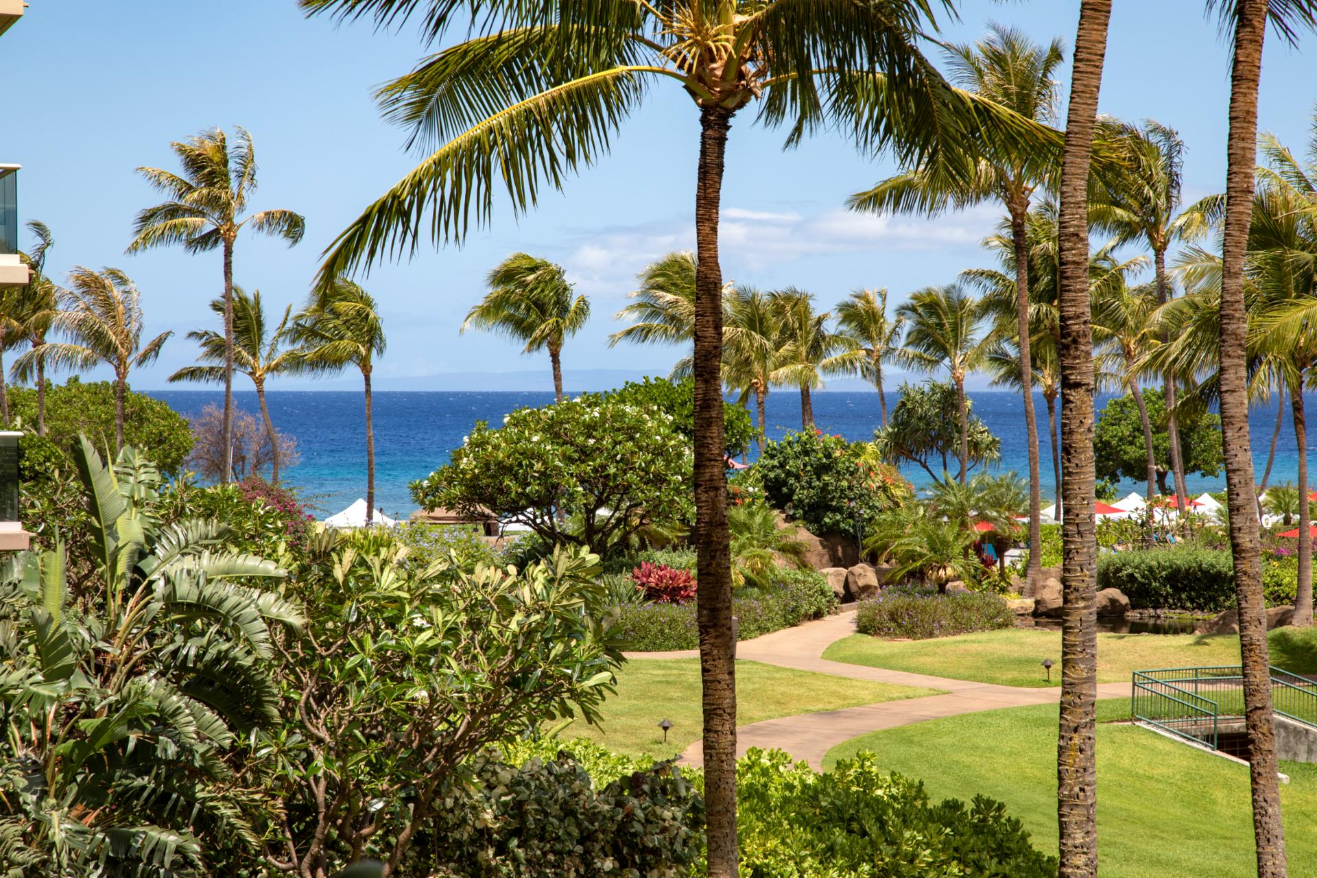 Ocean breeze, swaying palms, vibrant gardens, pure tropical paradise bliss