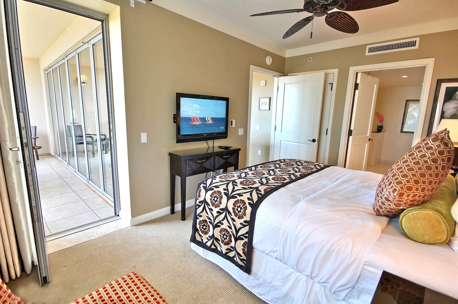 Wake up to paradise in a luxe master suite with direct lanai access, plush bedding, and serene Maui mornings