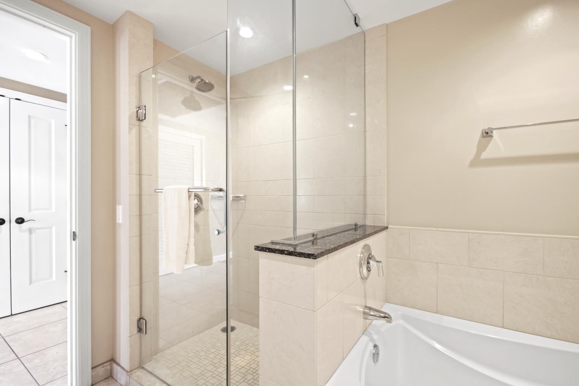 Generous layout with a deep tub, walk-in shower, and elegant finishes for total relaxation and convenience