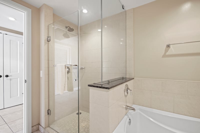 Generous layout with a deep tub, walk-in shower, and elegant finishes for total relaxation and convenience