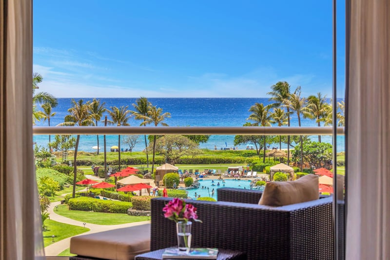 Al fresco dining meets postcard-perfect views on this tropical balcony