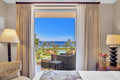 Soak up the scenery right from bed with this view-framed retreat