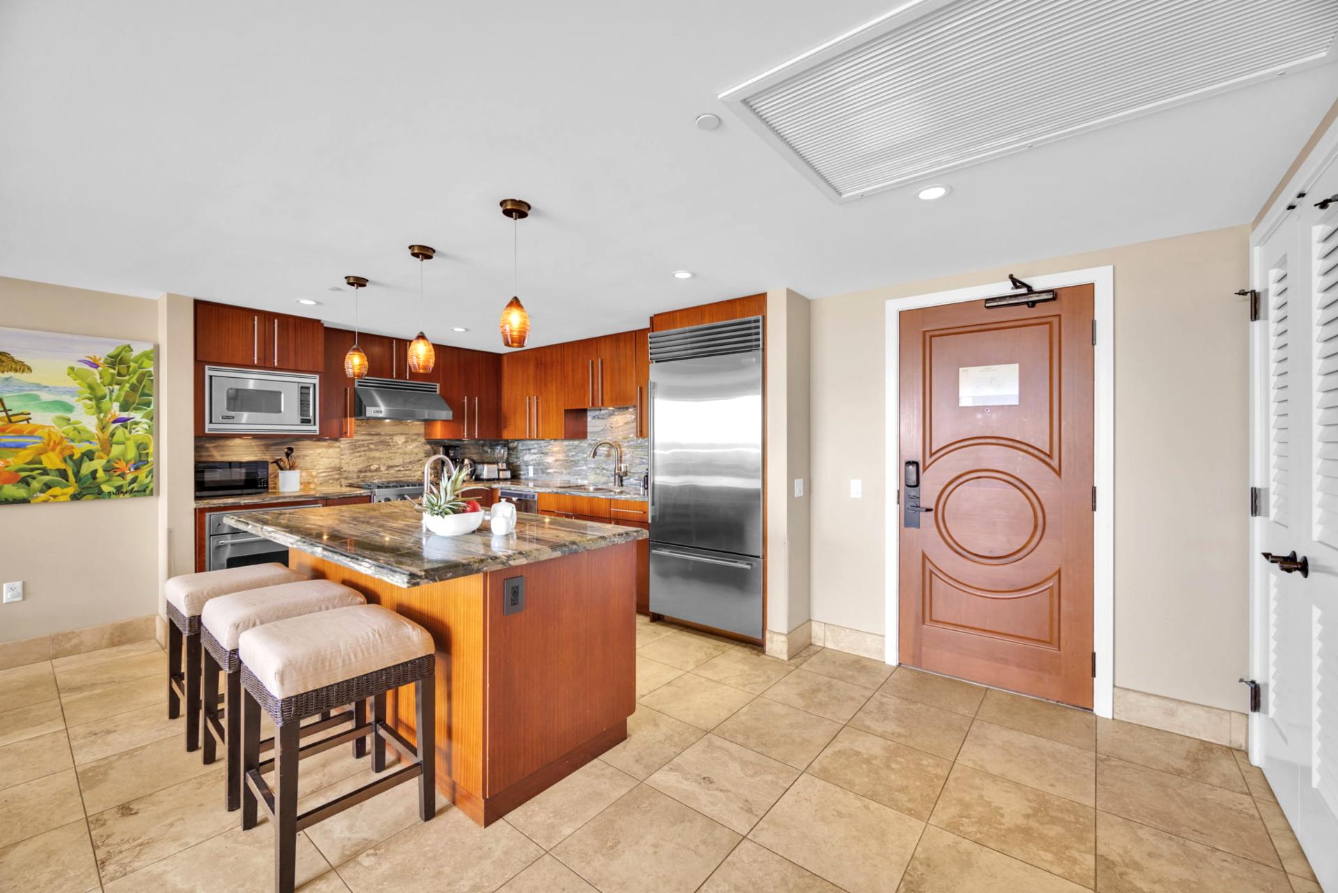 Cook with ease in this spacious kitchen with breakfast bar for seamless family breakfast before your island adventures