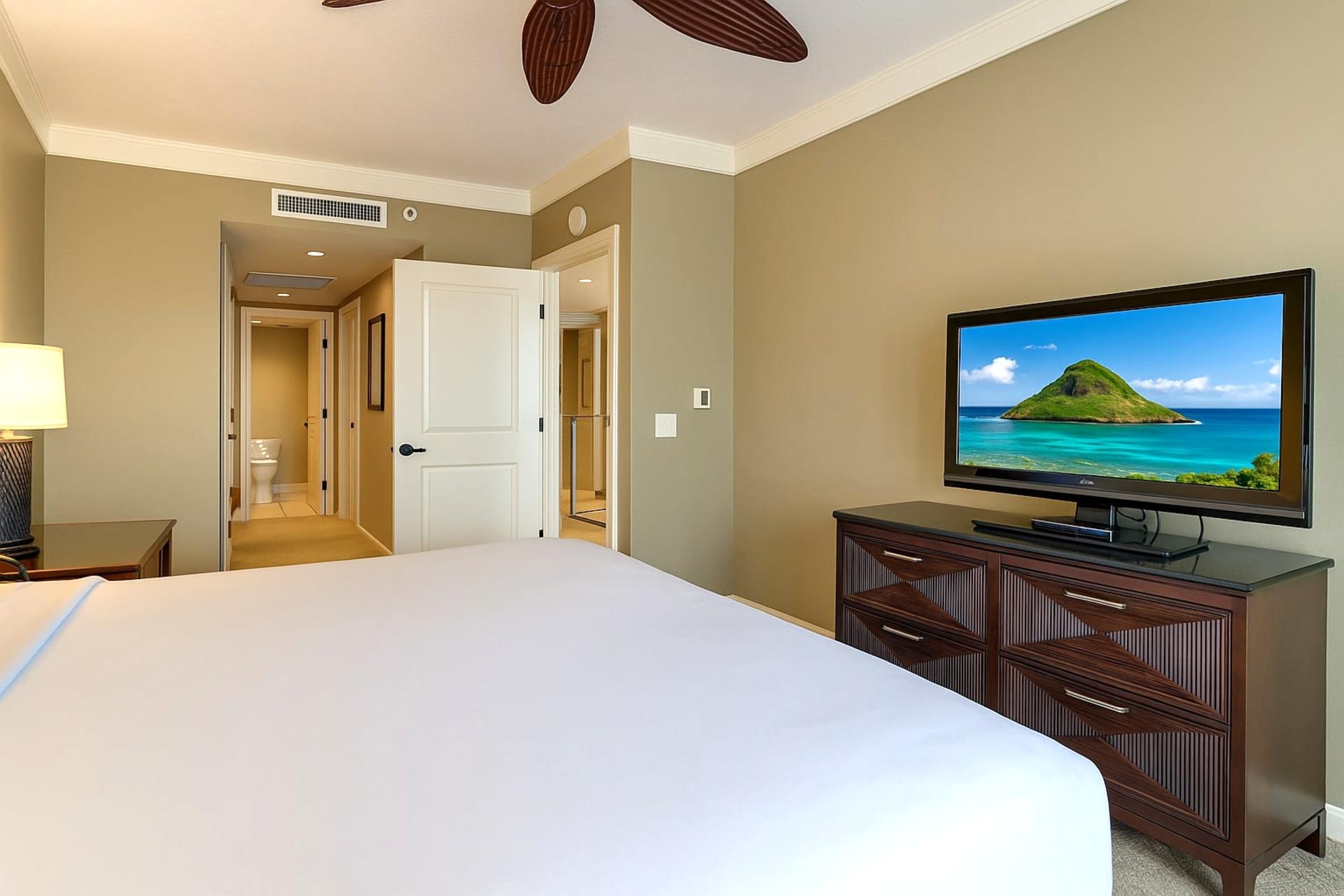 Wake Up in Paradise: The master bedroom provides a perfect blend of comfort and island charm.