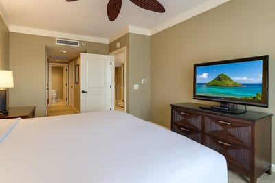 Wake Up in Paradise: The master bedroom provides a perfect blend of comfort and island charm.