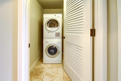 Full-size laundry tucked away so fresh clothes and beach towels are always within reach