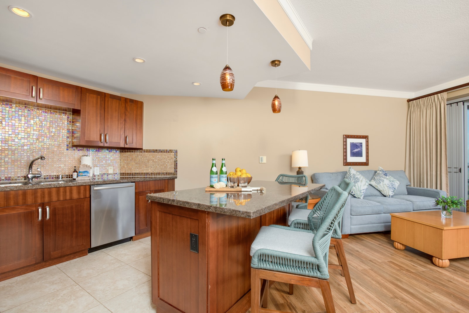 Whip up island-inspired meals in a stylish kitchen with granite counters and a view of the living space HKH-537