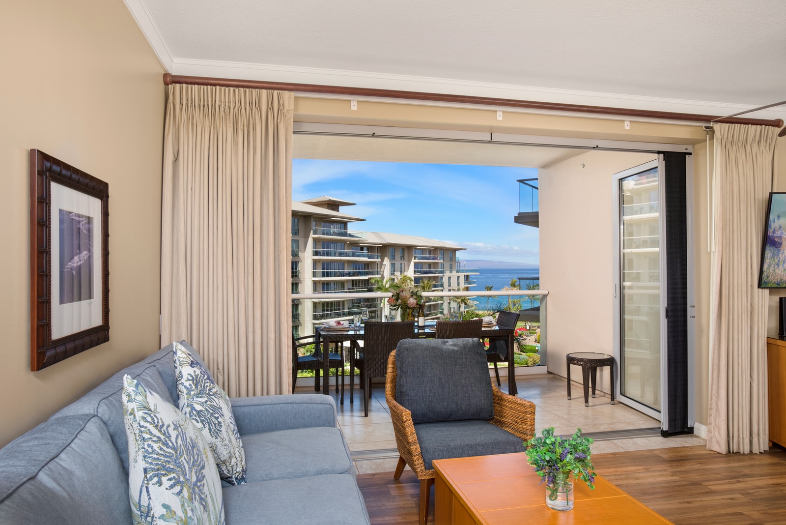 Relax and reconnect in a bright, open living space with ocean views, cozy seating, and seamless indoor-outdoor flow HKH-537