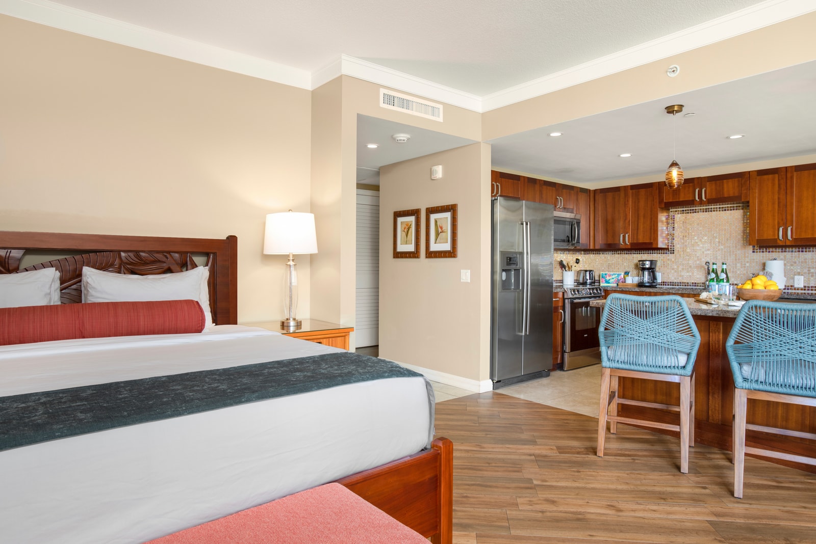 Wake up to comfort and convenience in this spacious suite, just steps from the kitchen and living area HKH-537