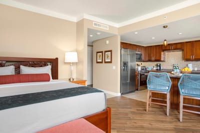 Wake up to comfort and convenience in this spacious suite, just steps from the kitchen and living area