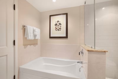 Relax and unwind in a deep soaking tub, perfect for a peaceful end to your day in paradise