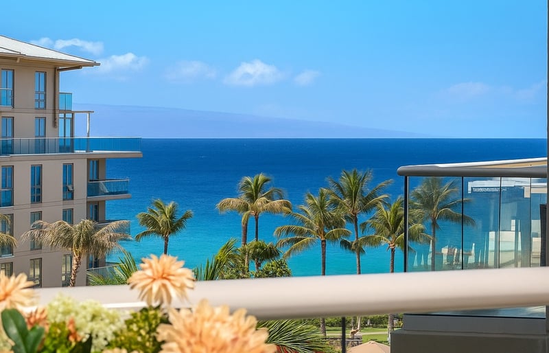 Wake up to postcard-perfect views of turquoise waters, swaying palms, and blue skies from your oceanfront lanai