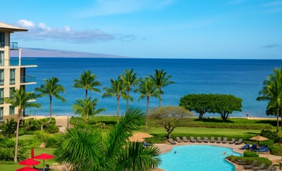 Bask in sweeping ocean views, tropical palms, and poolside luxury—just steps from the golden sands of Ka'anapali