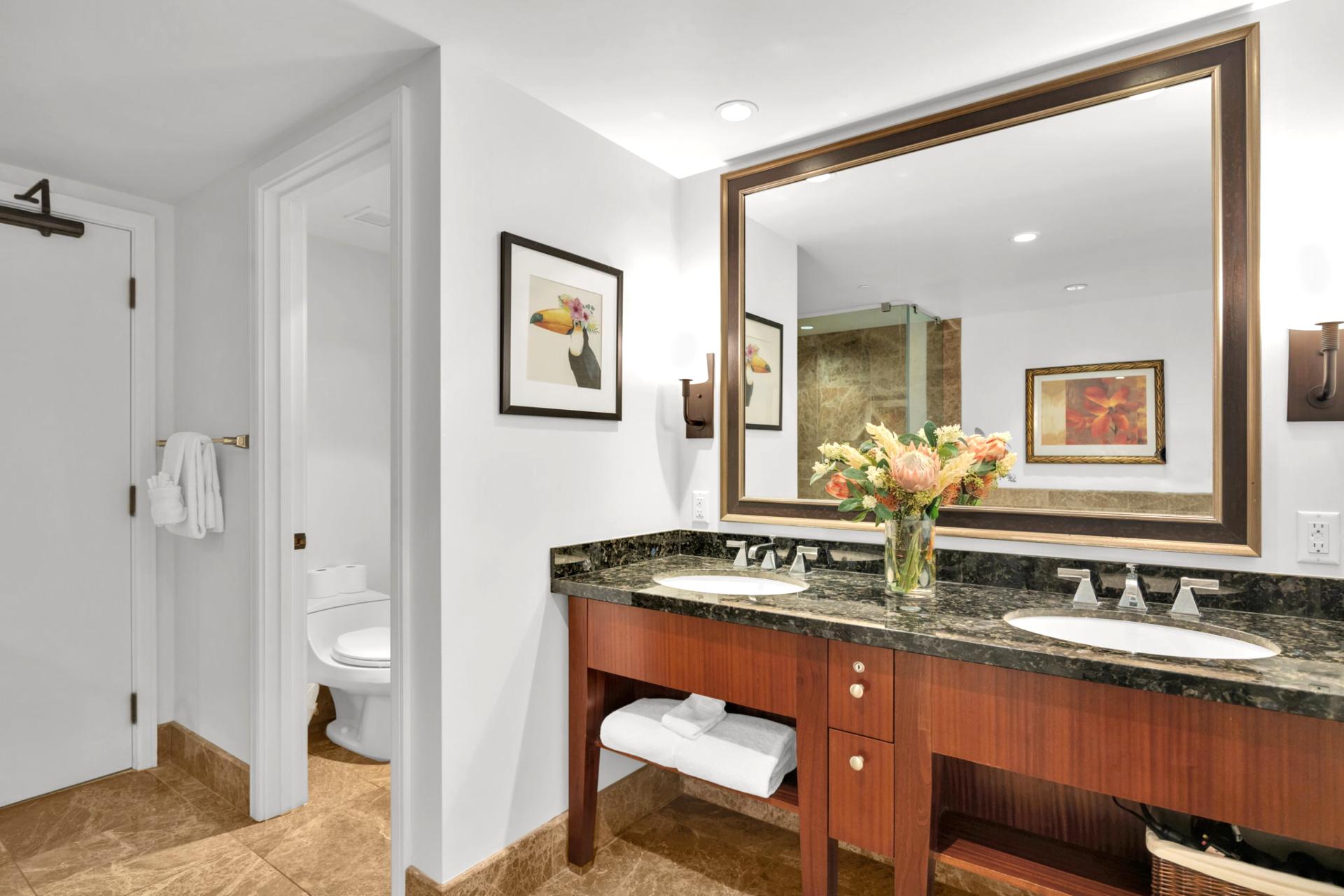 Spacious double vanity and separate water closet - perfect for your group to get ready for the day.