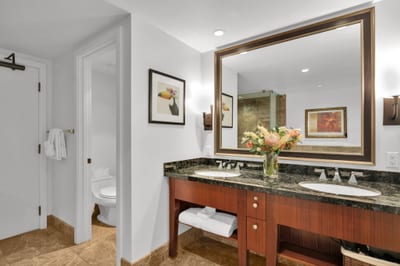 Spacious double vanity and separate water closet - perfect for your group to get ready for the day.
