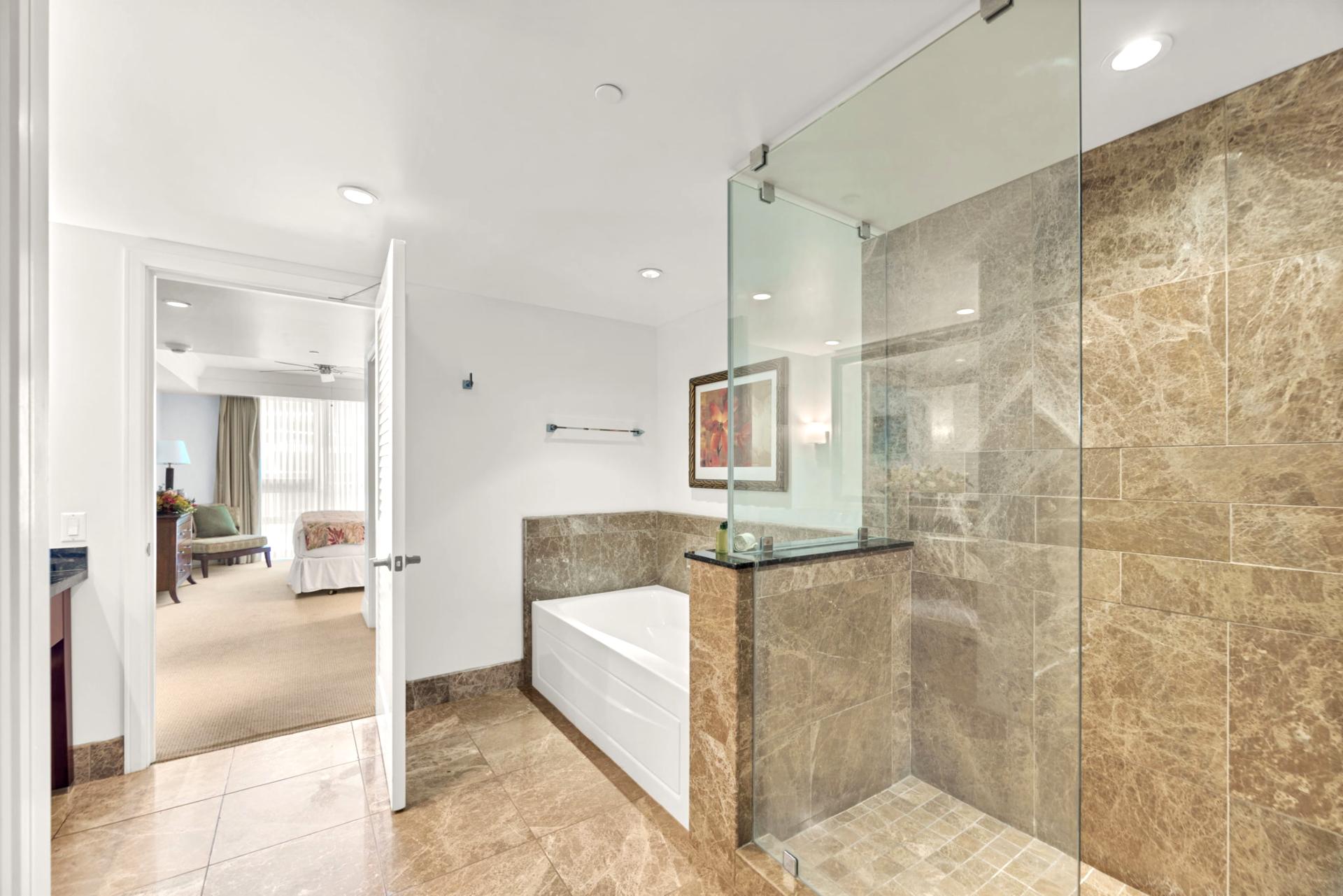 Spacious walk-in shower and large soaking tub - perfect for unwinding after the beach.