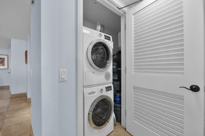 Enjoy the convenience of a full-size washer and dryer perfect for refreshing beachwear and extended stays HKH-550