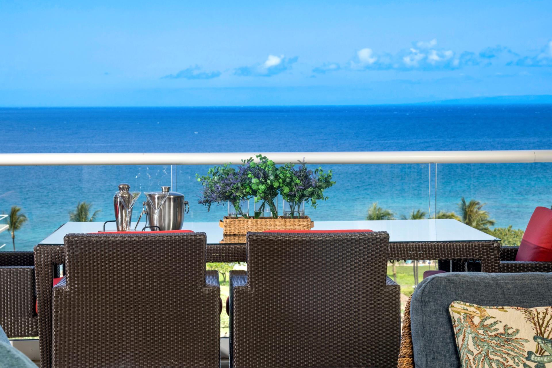 Sip, relax, and soak in breathtaking ocean views from this elegant lanai 
