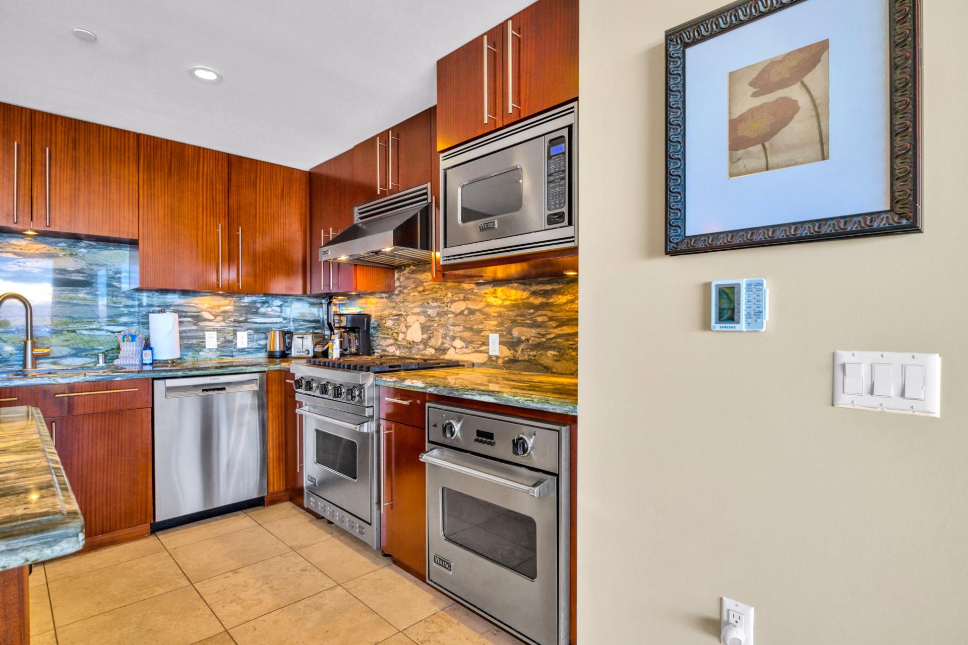 Gourmet kitchen with updated stainless steel appliances 