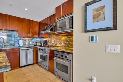 Gourmet kitchen with updated stainless steel appliances
