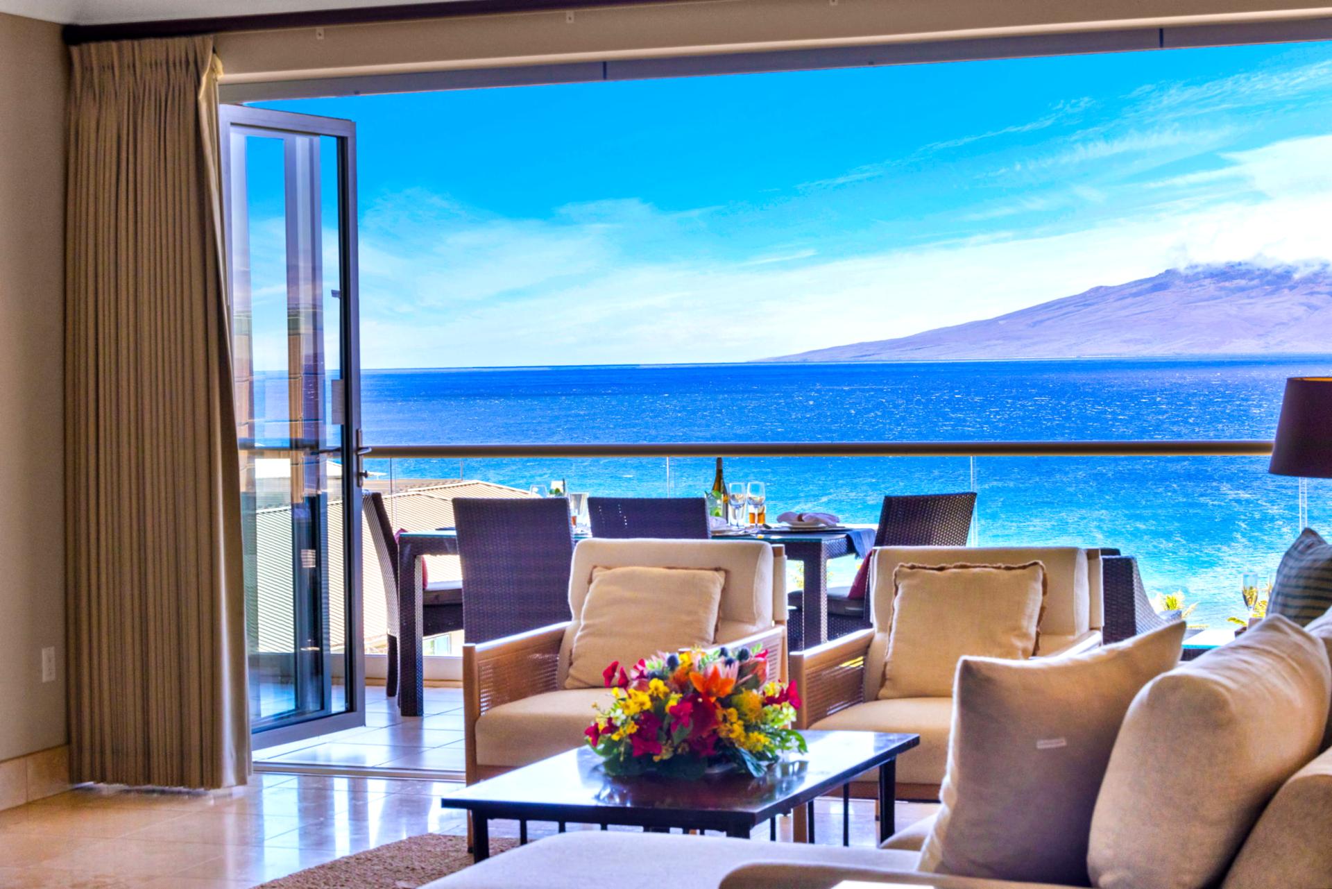 Elegant living room with floor-to-ceiling ocean views