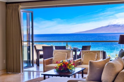 Elegant living room with floor-to-ceiling ocean views