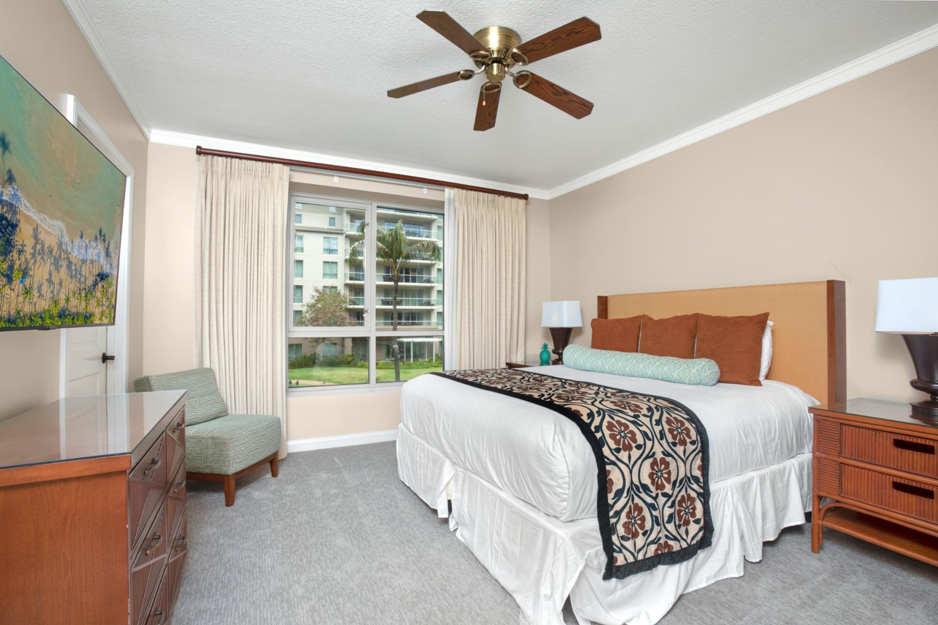 Tranquil bedroom retreat with garden views and modern comforts.
