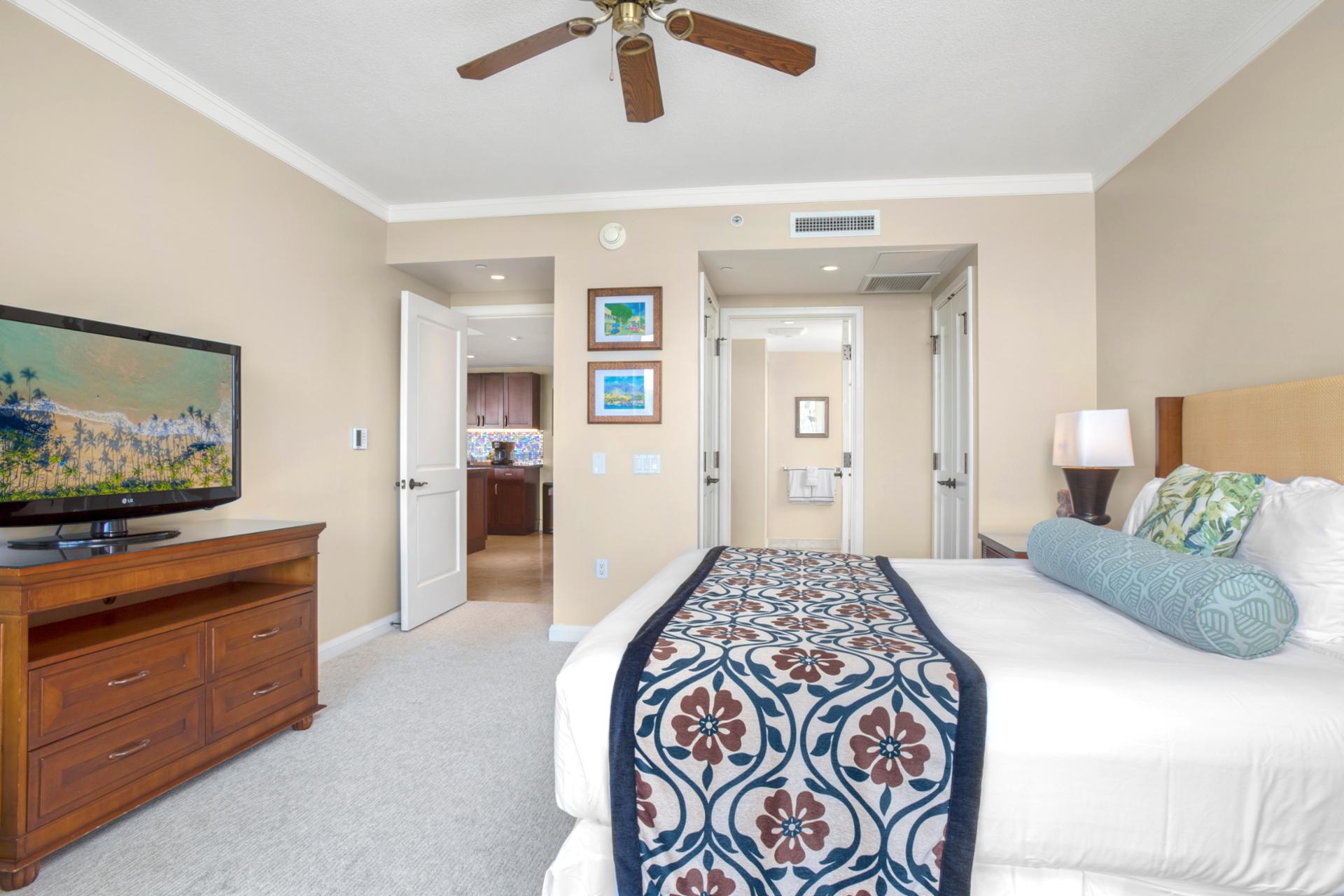 Spacious bedroom retreat with tropical elegance and resort-style modern amenities.