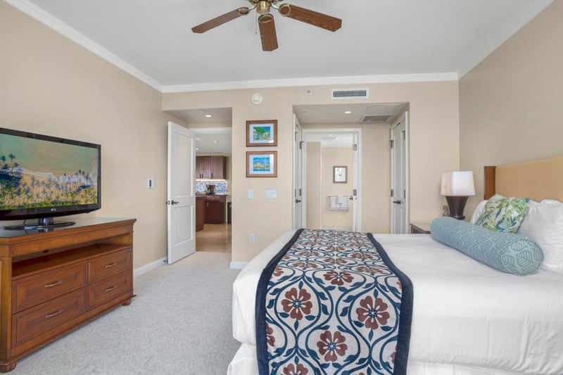 Spacious bedroom retreat with tropical elegance and resort-style modern amenities.