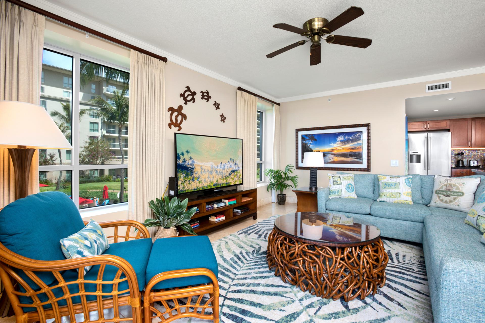 Living room flows into paradise with wall-to-wall glass sliders