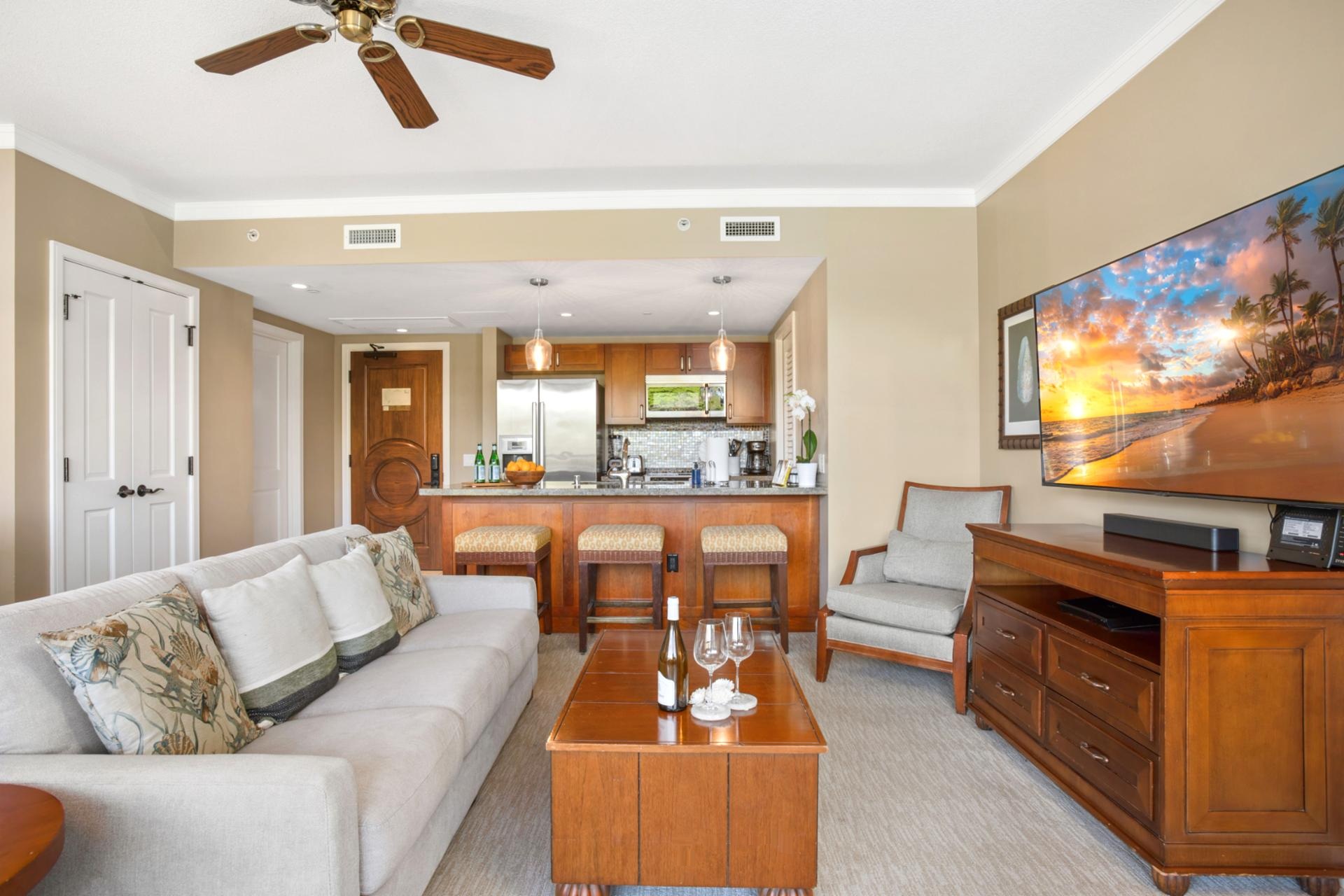 Soothing island living with bright open-plan design, stainless kitchen, comfy sofa & smart TV for easy nights