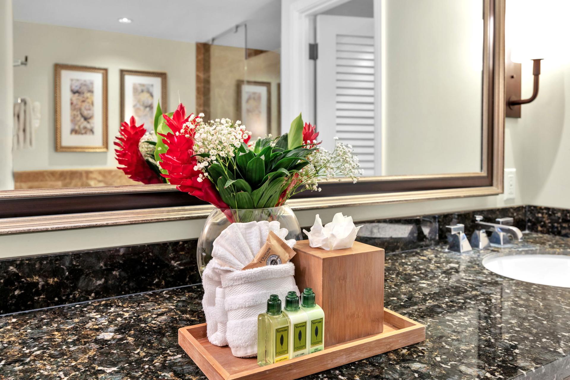 Elegant guest bath with fresh island touches and L'Occitane bath amenities