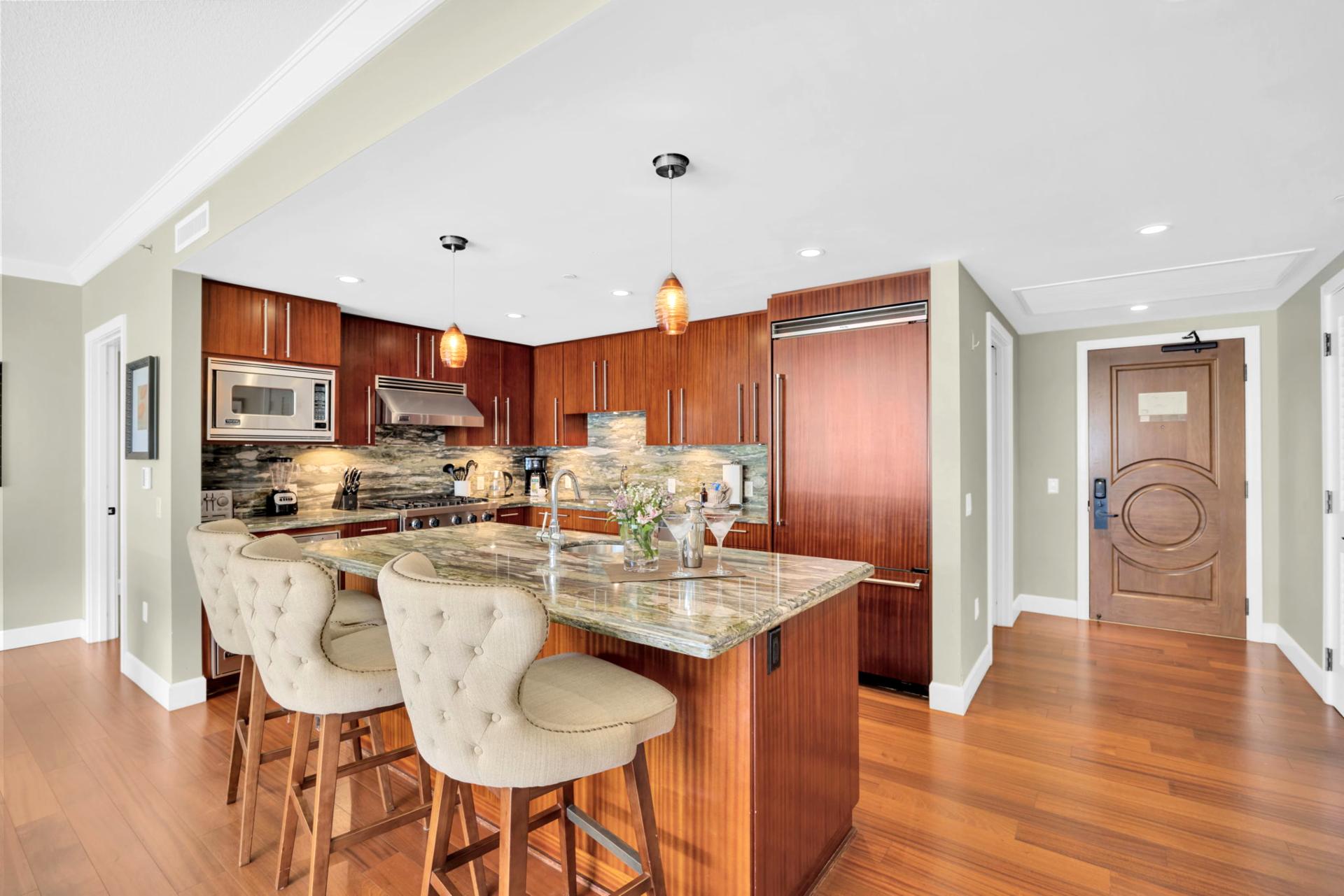 Gourmet kitchen with breakfast bar seating