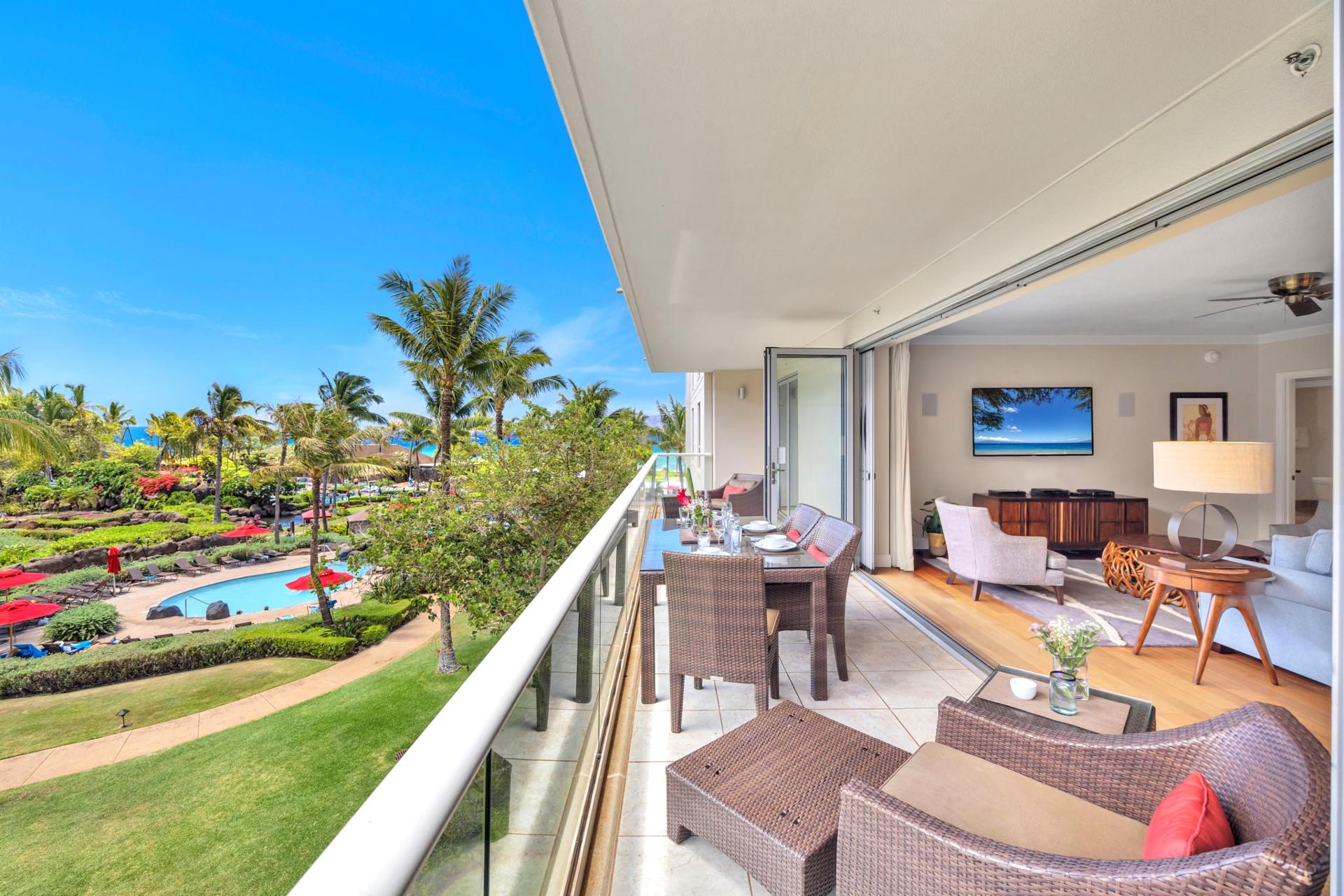 Overlook the pool and gardens from your private balcony