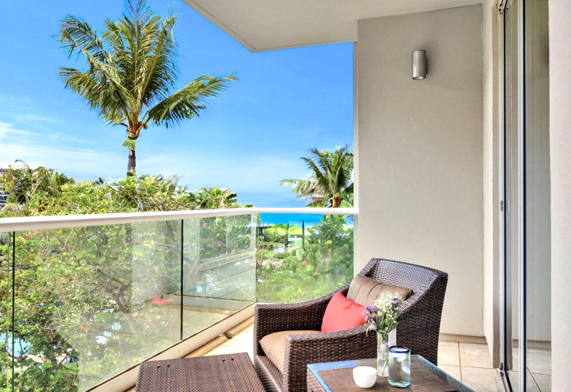 Relax on the lanai with partial ocean and full views of the lawn