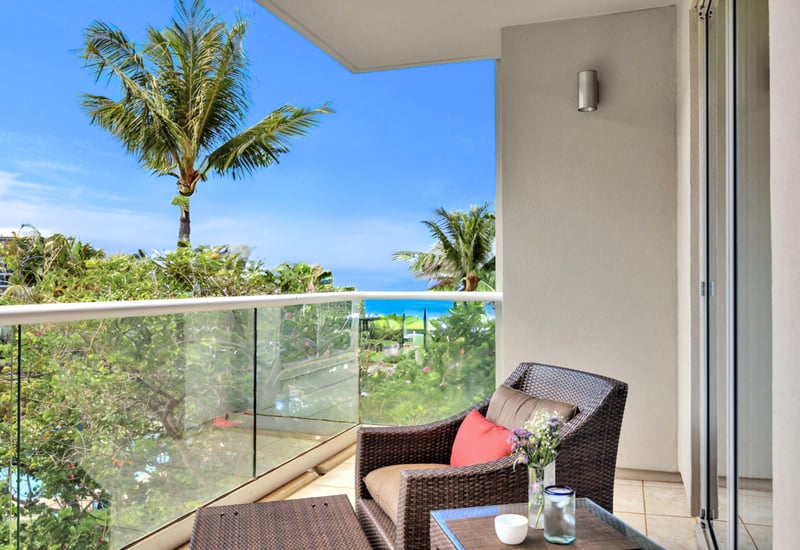 Relax on the lanai with partial ocean and full views of the lawn HKK-349