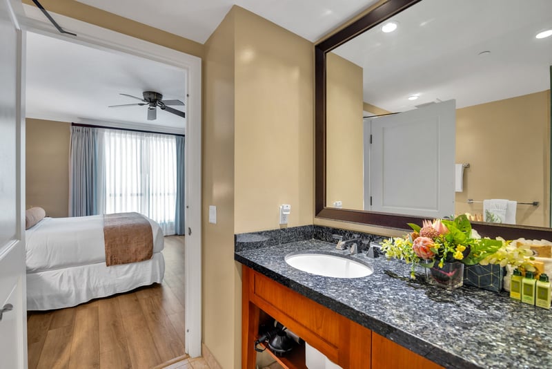 Guest bath with granite vanity and fresh touches