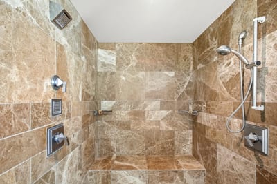 Spacious shower with dual heads make for ultimate luxury