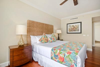 This master bed offers plenty of space for restful nights in paradise