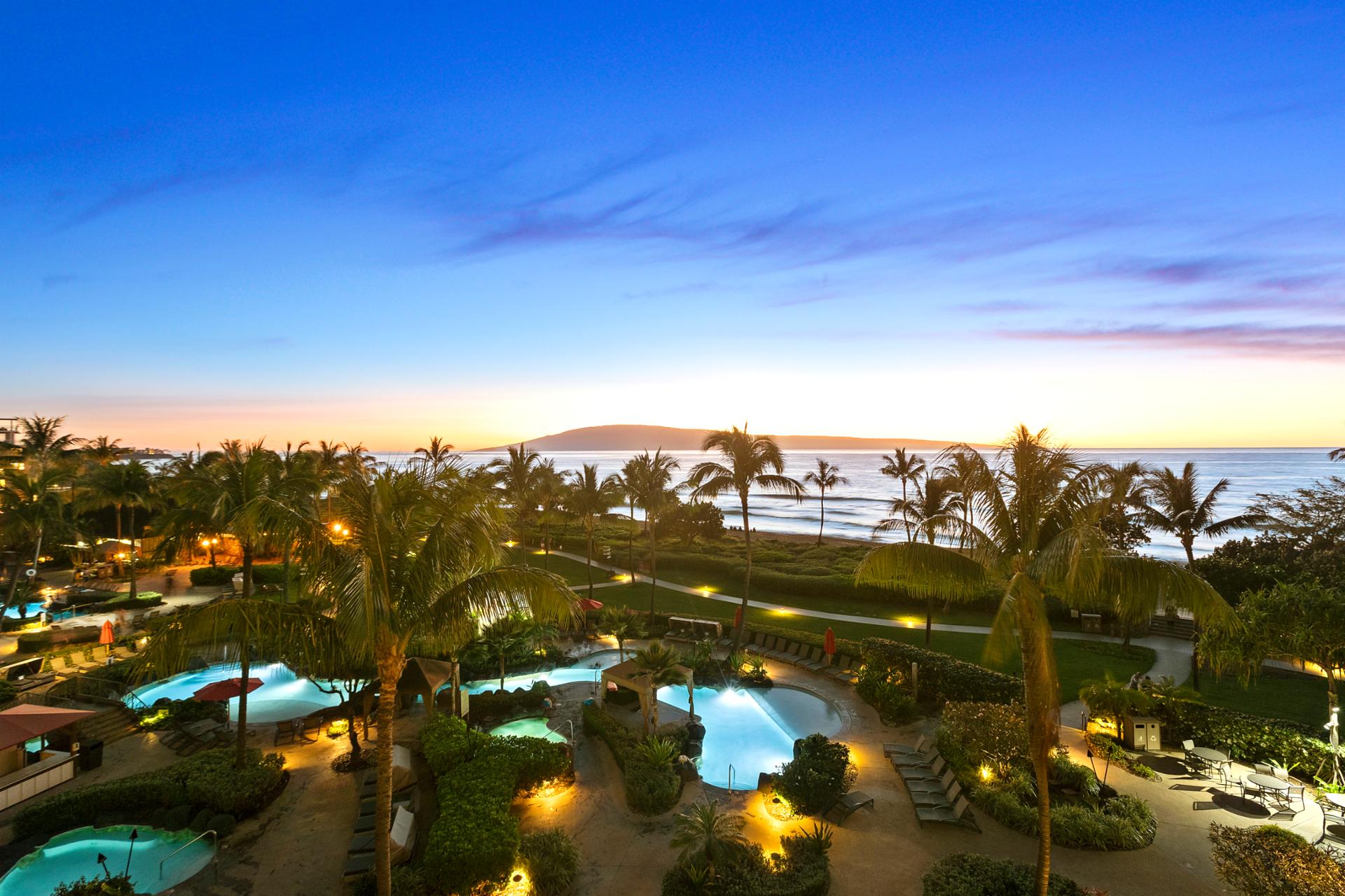 Tropical perfection from above—lush gardens, sparkling pools, and the Maui coastline come together at Honua Kai
