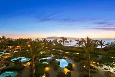 Tropical perfection from above—lush gardens, sparkling pools, and the Maui coastline come together at Honua Kai HKK-451